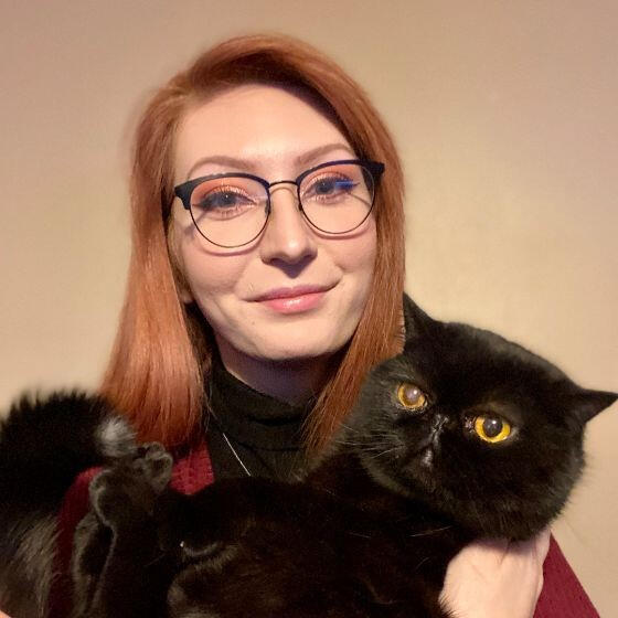 Julia & Juju A photo of Julia holding her cat, Juju